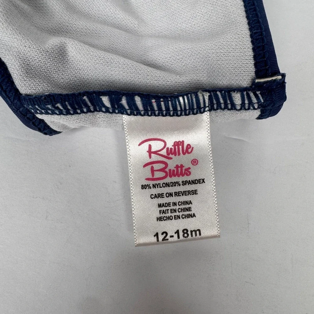 RuffleButts Navy Blue Ruffled Swim Bottoms Baby Girl 12-18M Triple Tier Ruffle